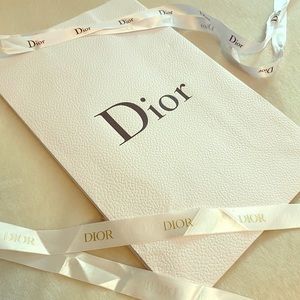 Dior Paper bag with ribbons.